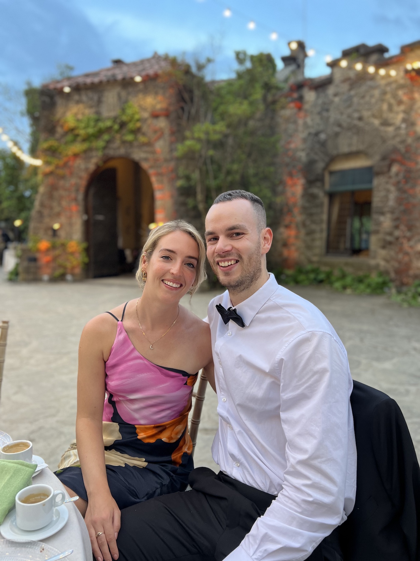 Jess and Lewis at a wedding